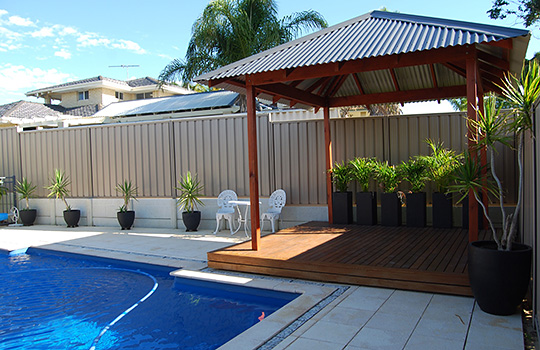 Patio next to pool